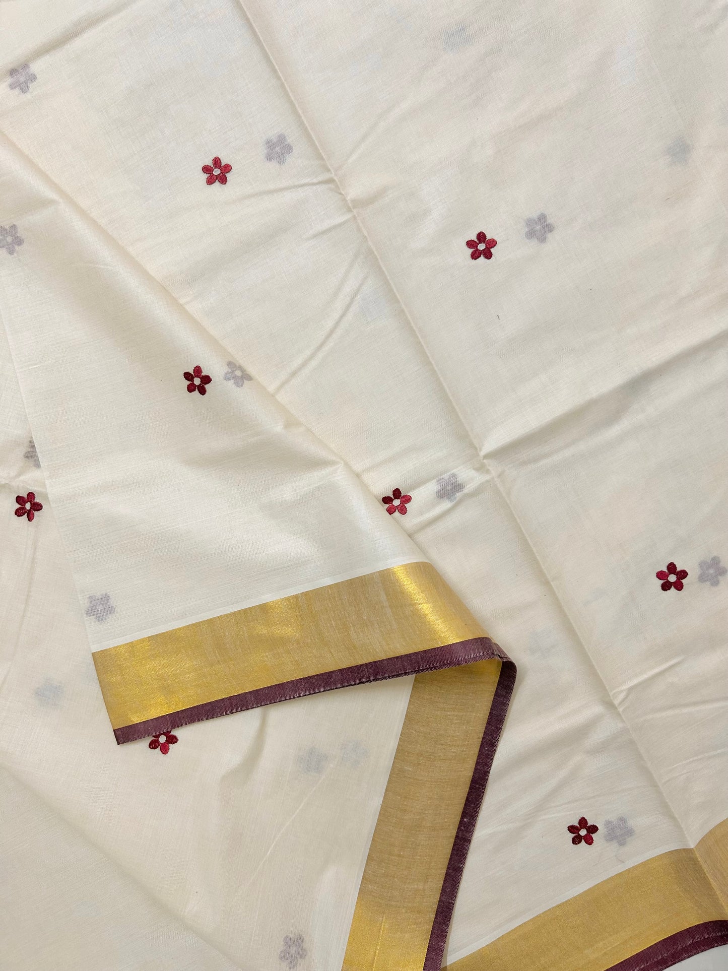 Kasavu saree in floral embroidery - maroon