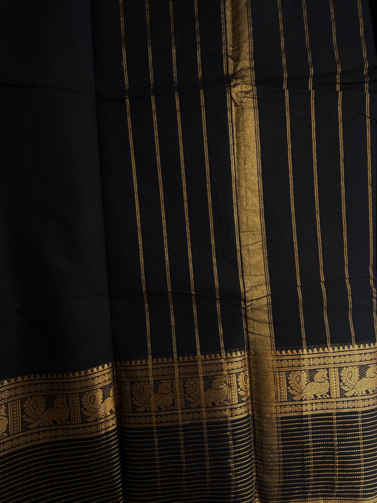 Black Kanchi cotton saree with zari lines border