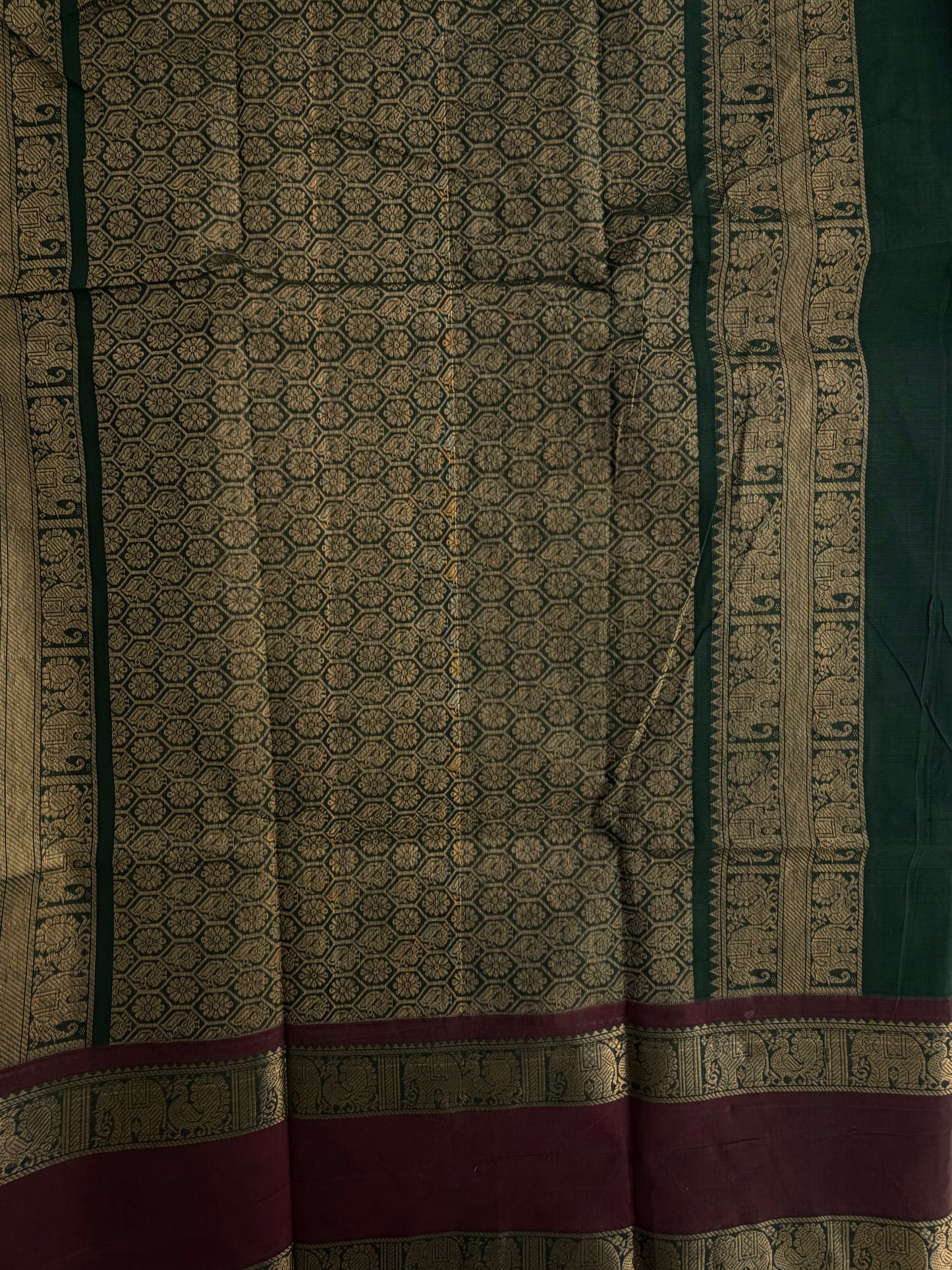 Kanchi cotton saree with checks & butta weaves with a grand pallu - green