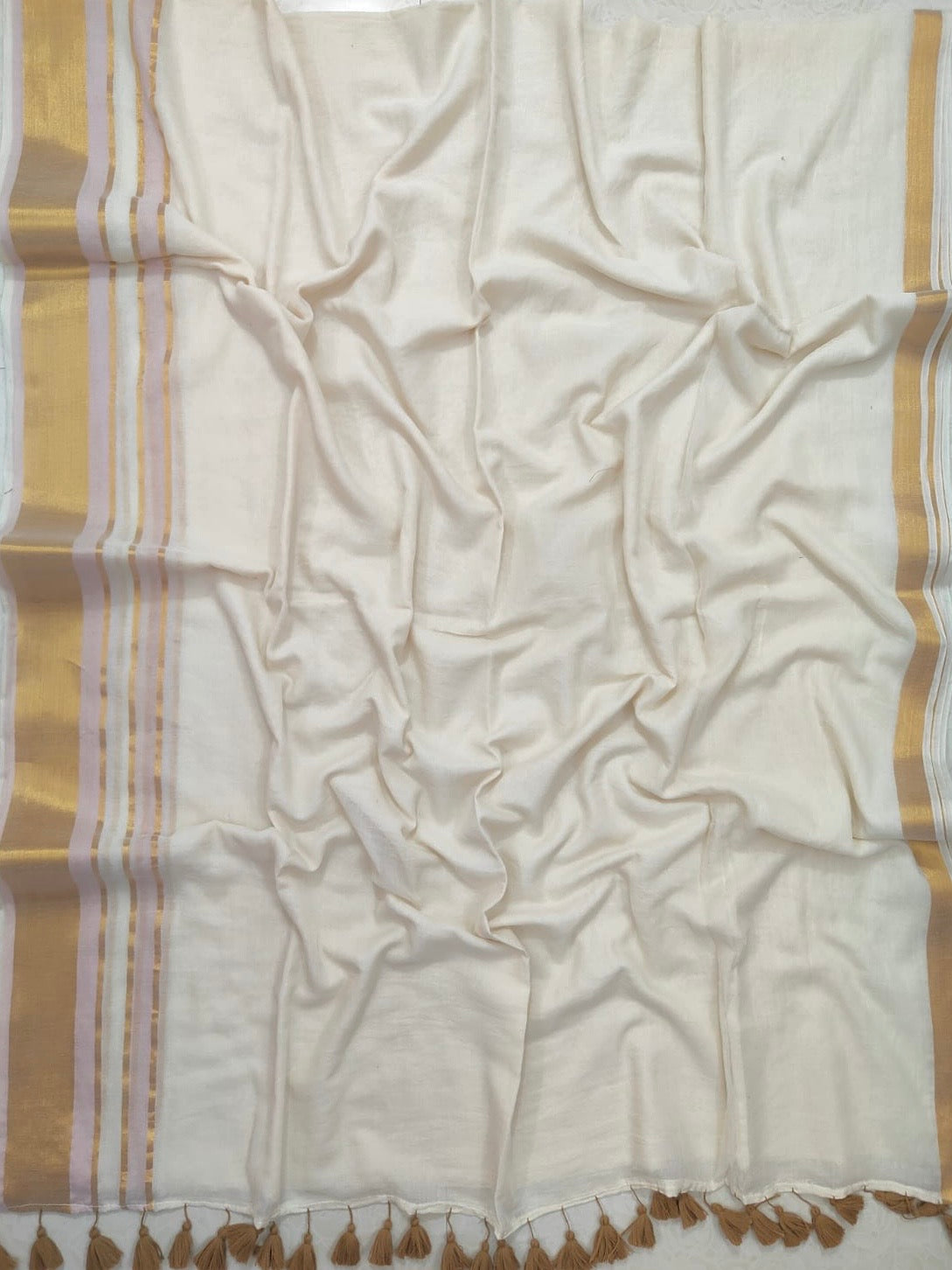 Off white Mul mul saree with zari borders