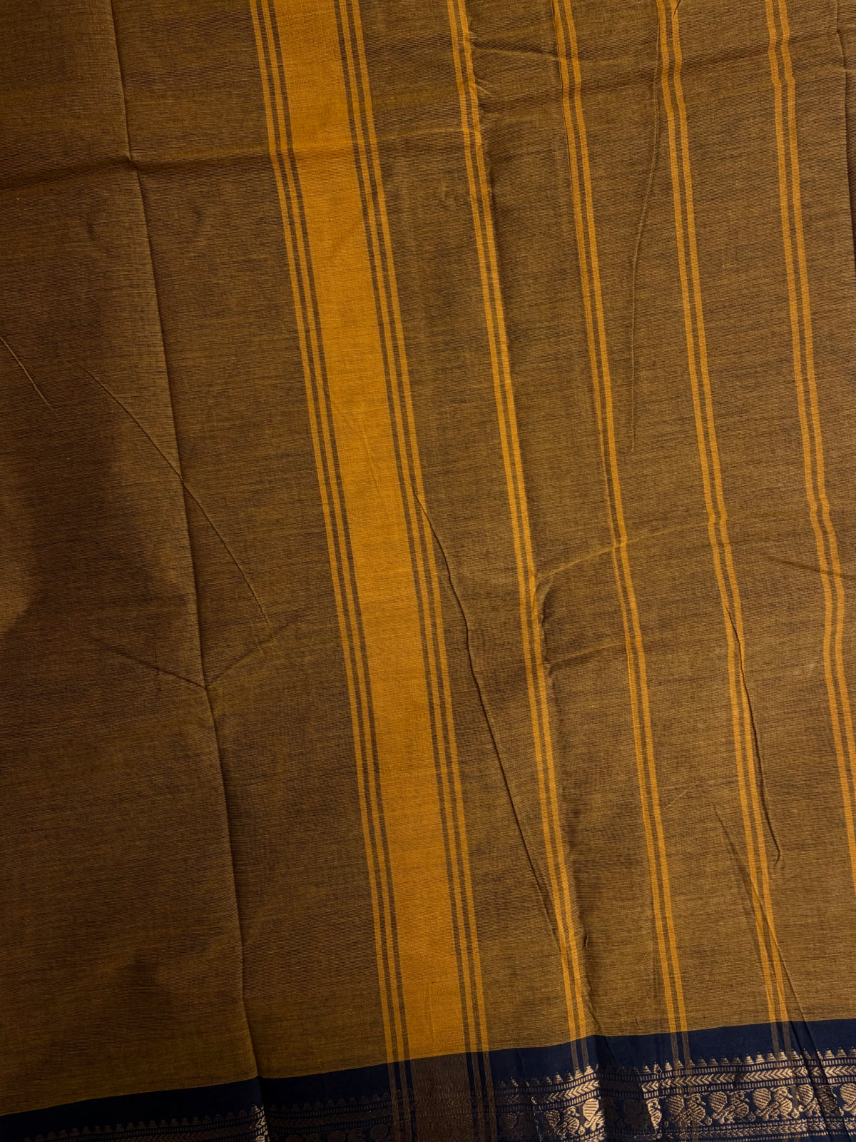 Mustard Kanchi cotton saree with minimal zari black border