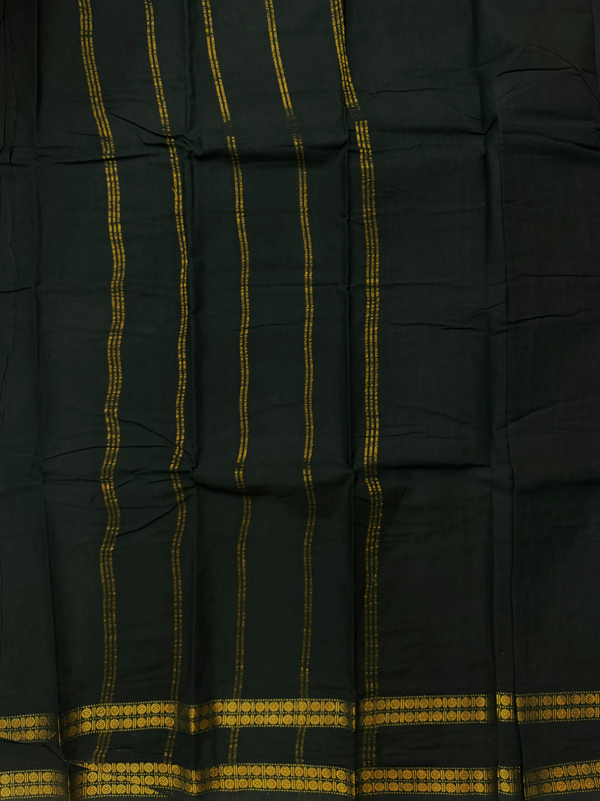 Sungudi saree with minimal zari border dark green