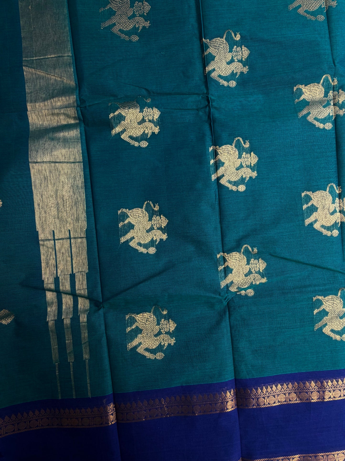 Kanchi cotton saree with butta weaves & zari pallu