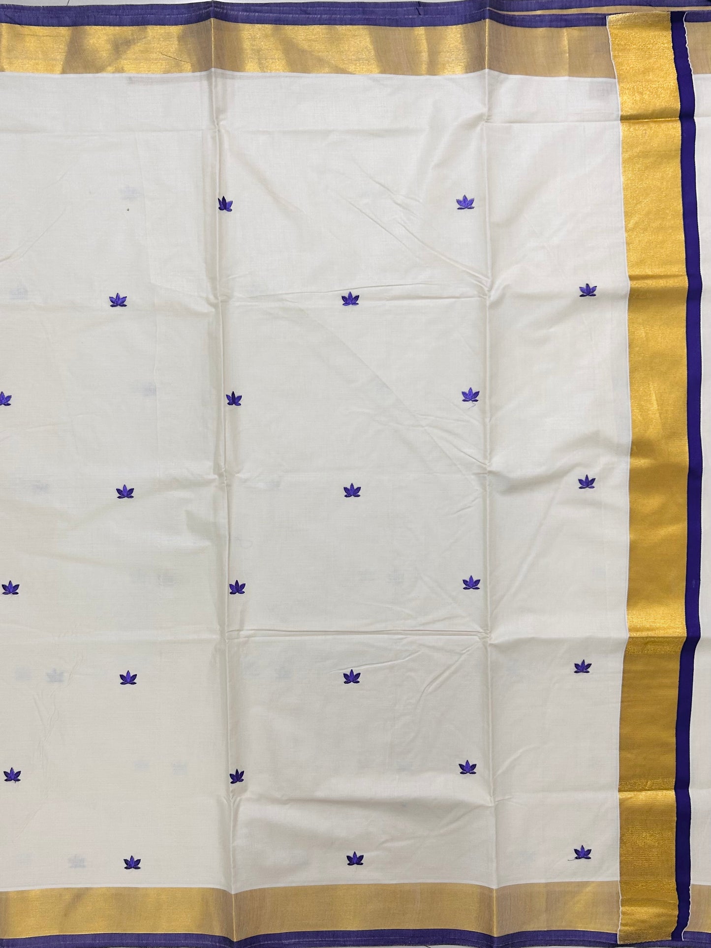 Kasavu saree in lotus embroidery - Russian violet
