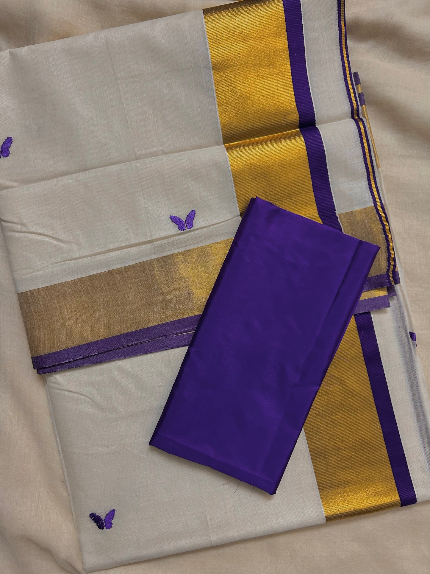 Kasavu saree in embroidery - Russian violet