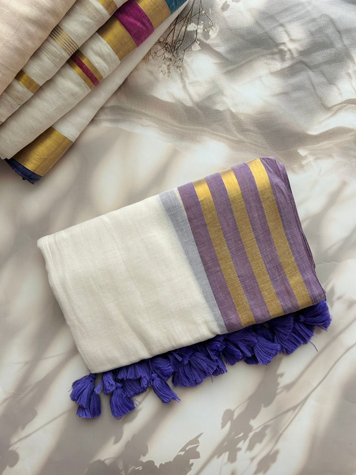 Off white Mul mul saree with zari borders