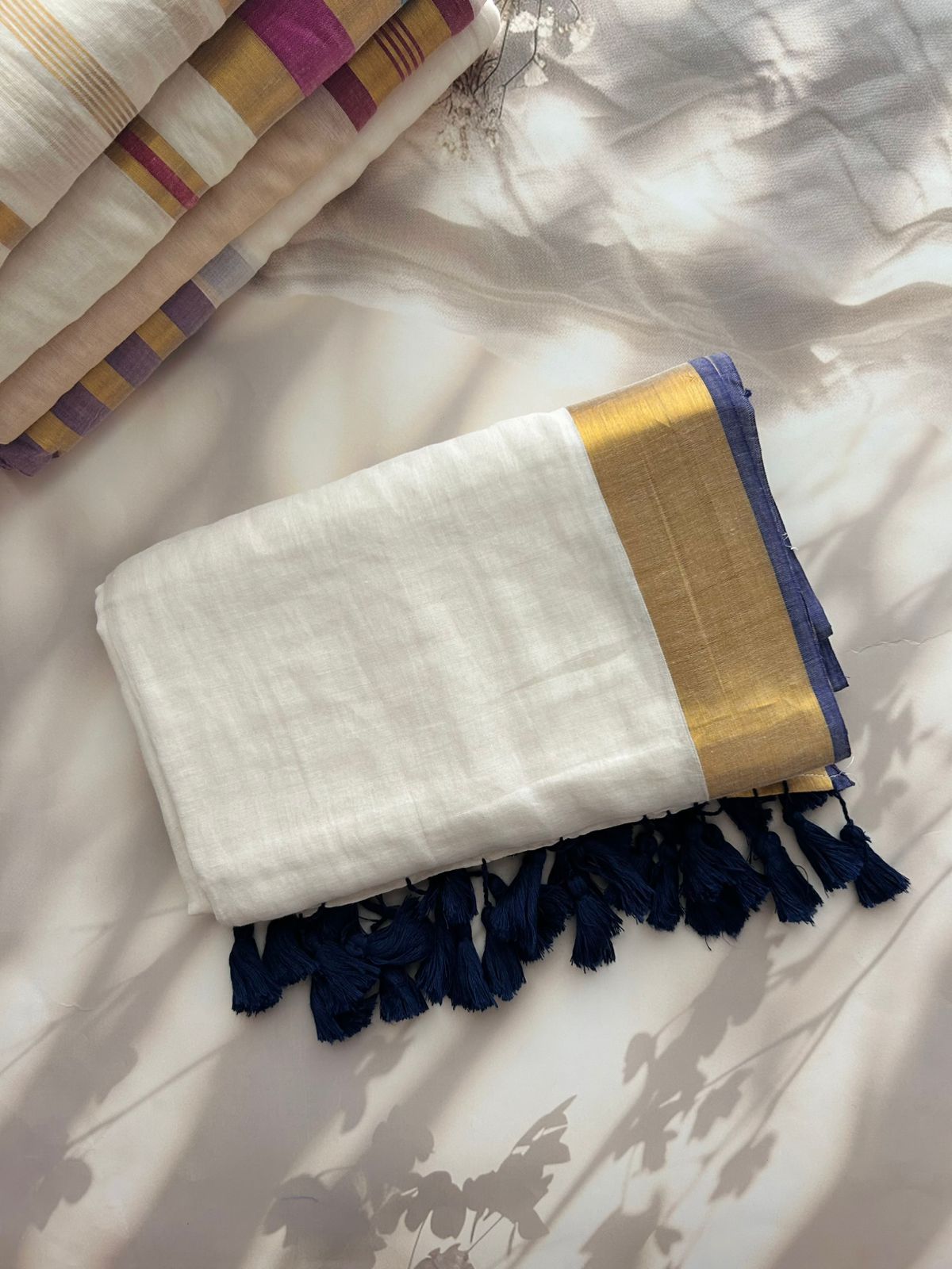 Off white Mul mul saree with zari borders