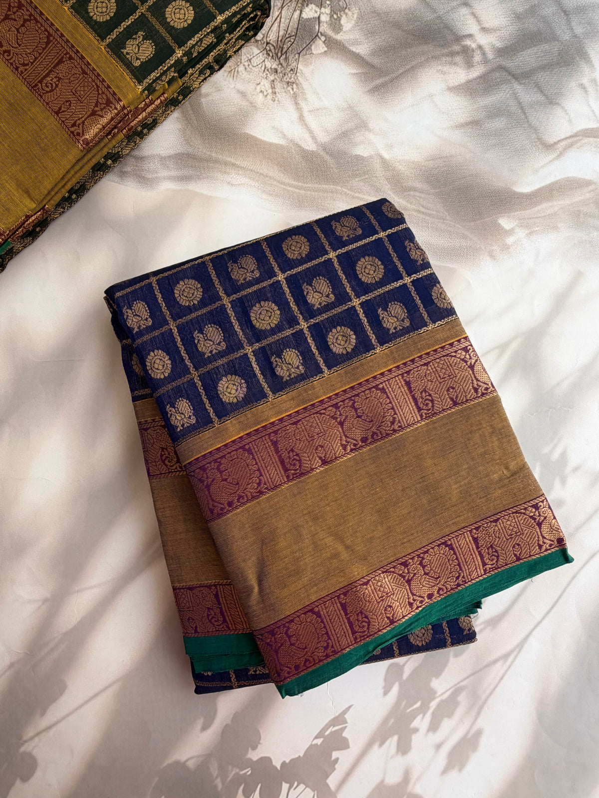 Kanchi cotton saree in 1000 buttas & zari check weaves with grand pallu blue