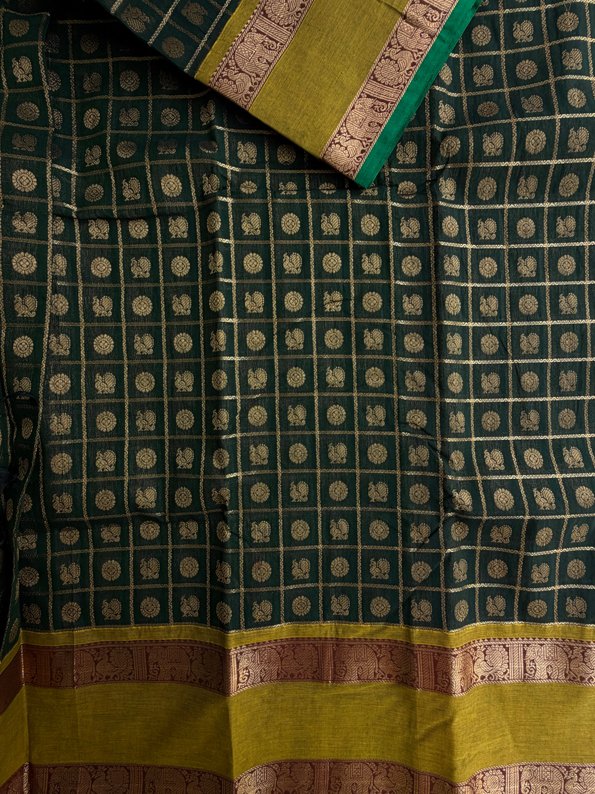 Kanchi cotton saree in 1000 buttas & zari check weaves with grand pallu Green