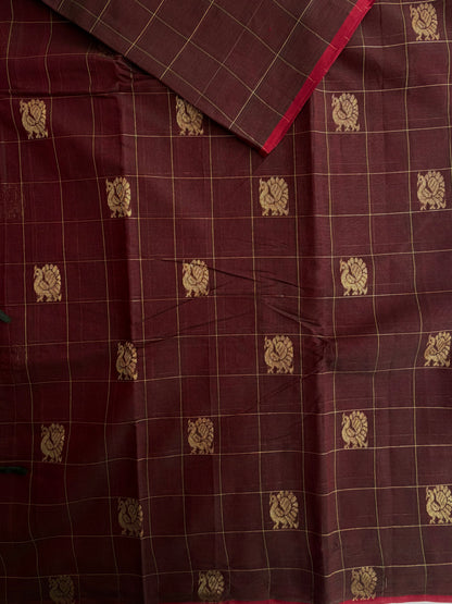 Kanchi cotton saree with checks & peacock zari weaves with a grand pallu