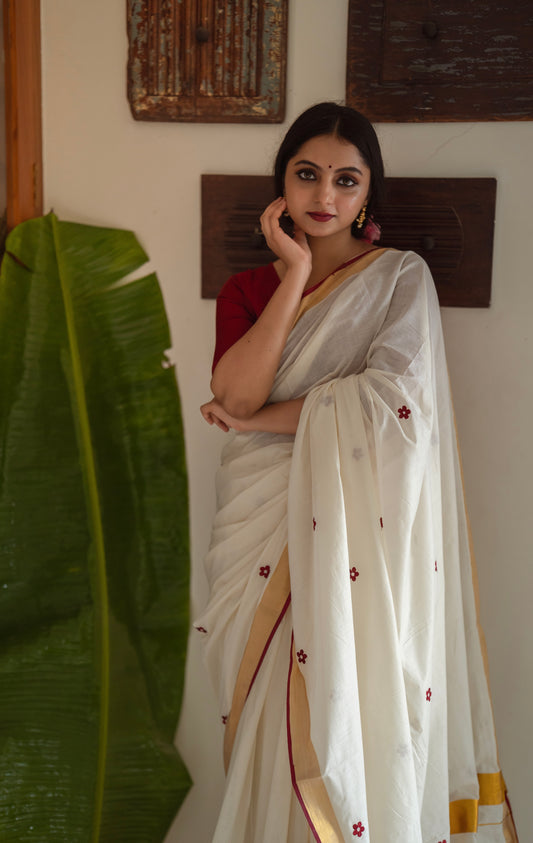 Kasavu saree in floral embroidery - maroon