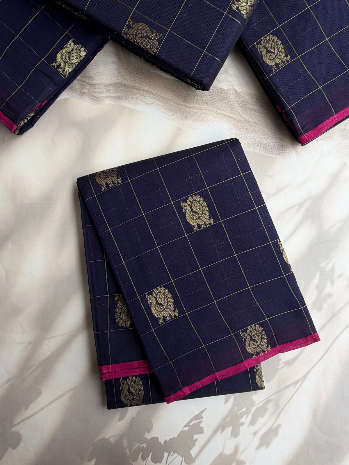 Kanchi cotton with peacock zari checks & butta weaves and grand pallu