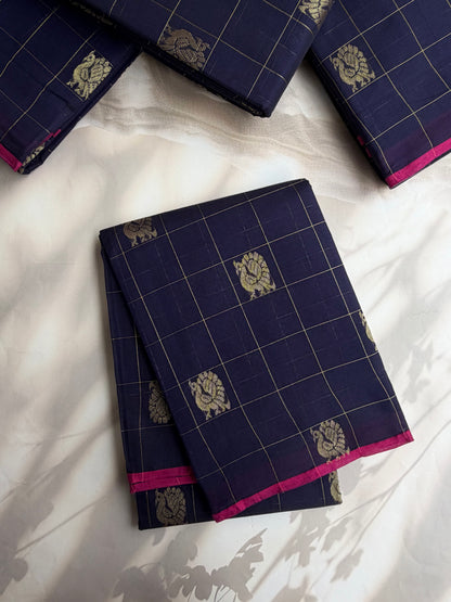 Kanchi cotton with peacock zari checks & butta weaves and grand pallu