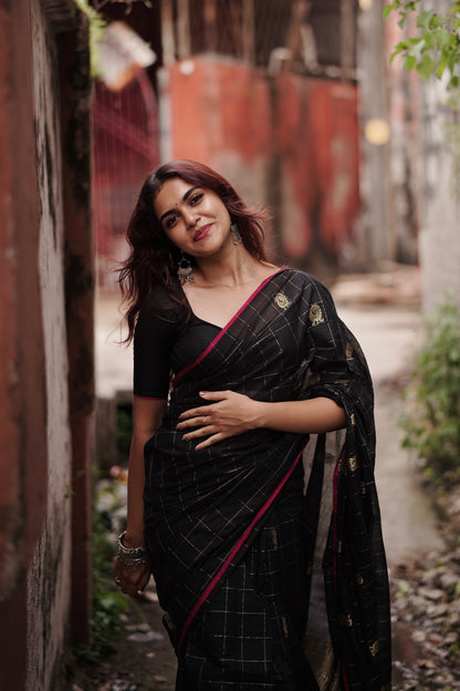 Kanchi cotton with premium zari weaves black with pink border