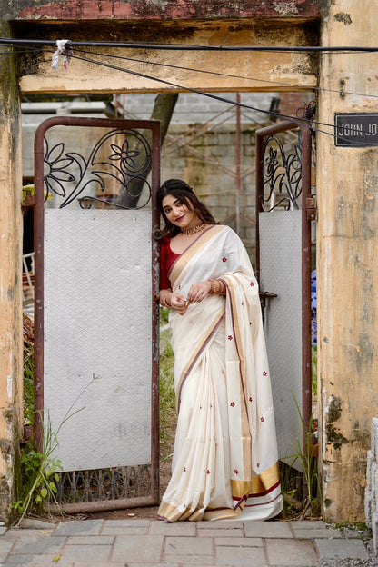 Kasavu saree in floral embroidery - maroon