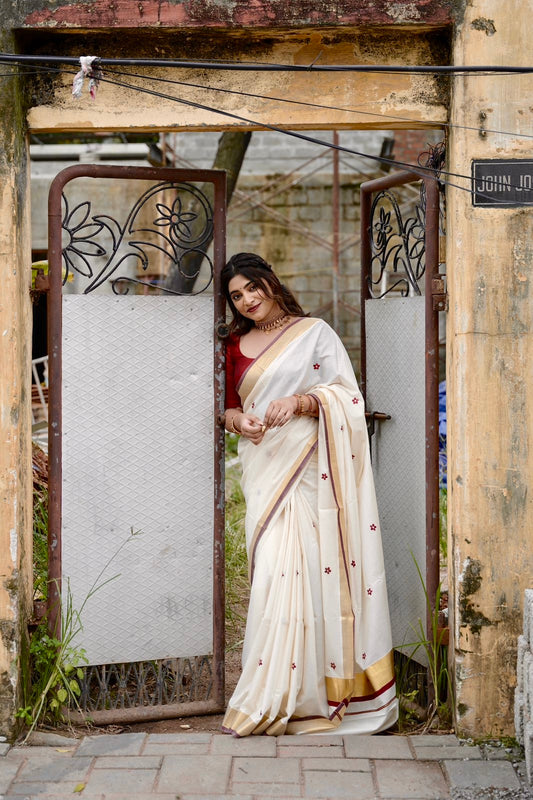 Kasavu saree in floral embroidery - maroon