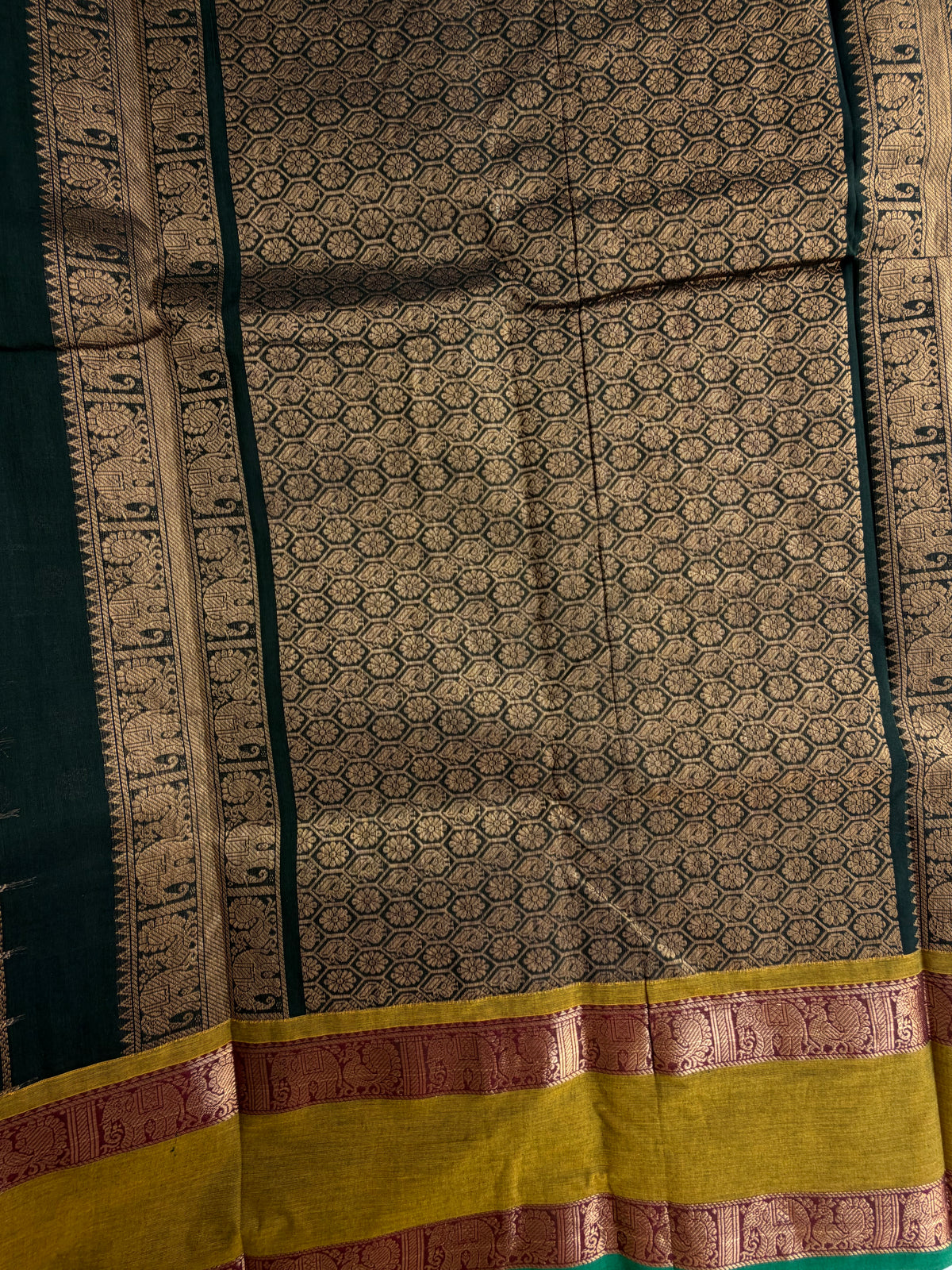 Kanchi cotton saree in 1000 buttas & zari check weaves with grand pallu Green