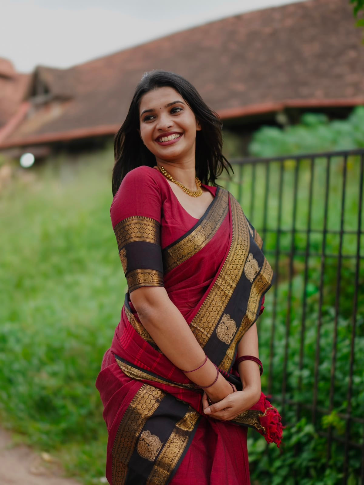 Kanchi cotton saree with zari weaves - maroon with black border