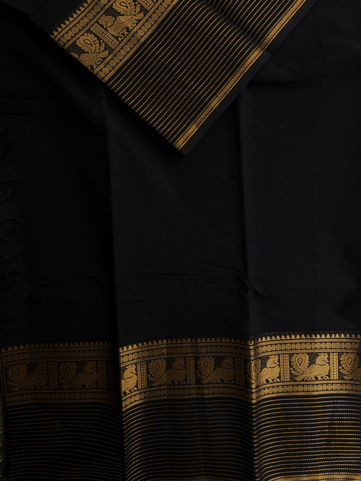 Black Kanchi cotton saree with zari lines border