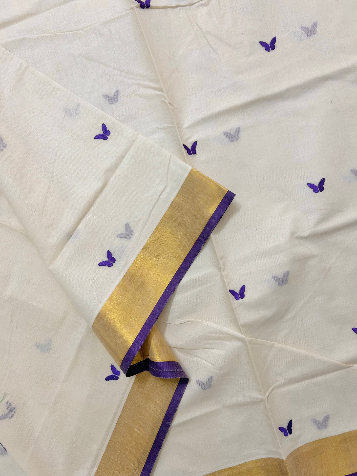 Kasavu saree in embroidery - Russian violet