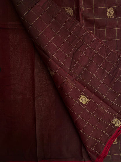 Kanchi cotton saree with checks & peacock zari weaves with a grand pallu
