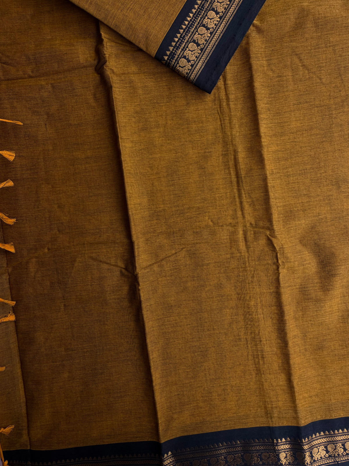 Mustard Kanchi cotton saree with minimal zari black border