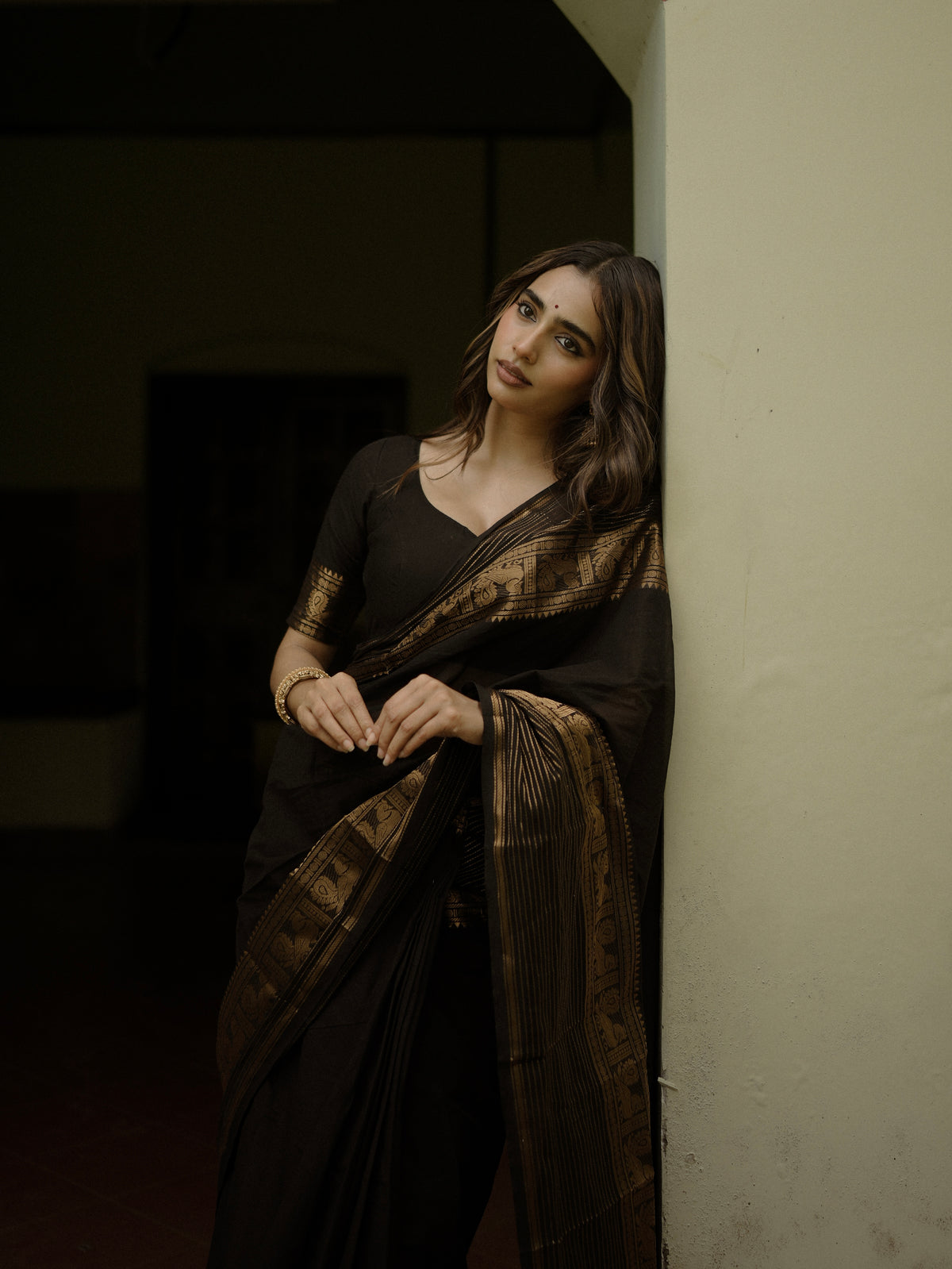 Black Kanchi cotton saree with zari lines border