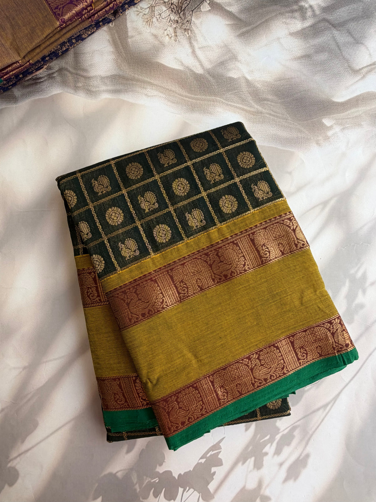 Kanchi cotton saree in 1000 buttas & zari check weaves with grand pallu Green