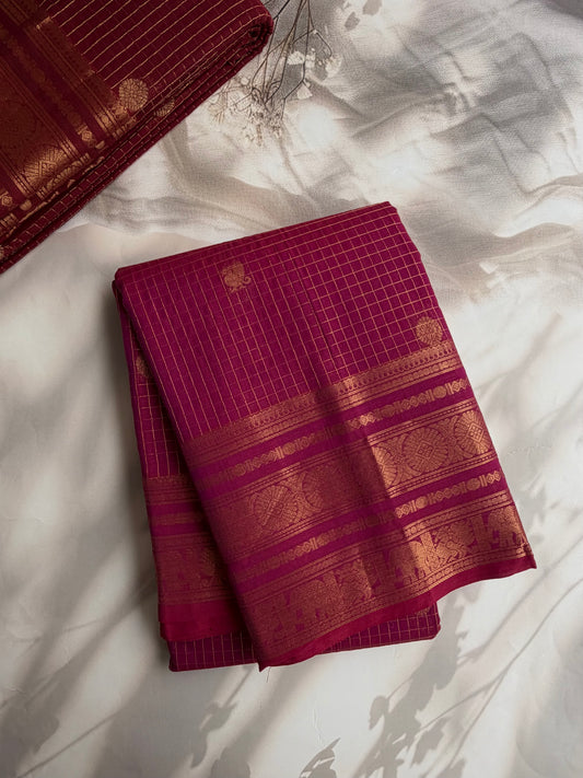 Kanchi cotton saree in checks & butta weaves with a grand pallu - pink