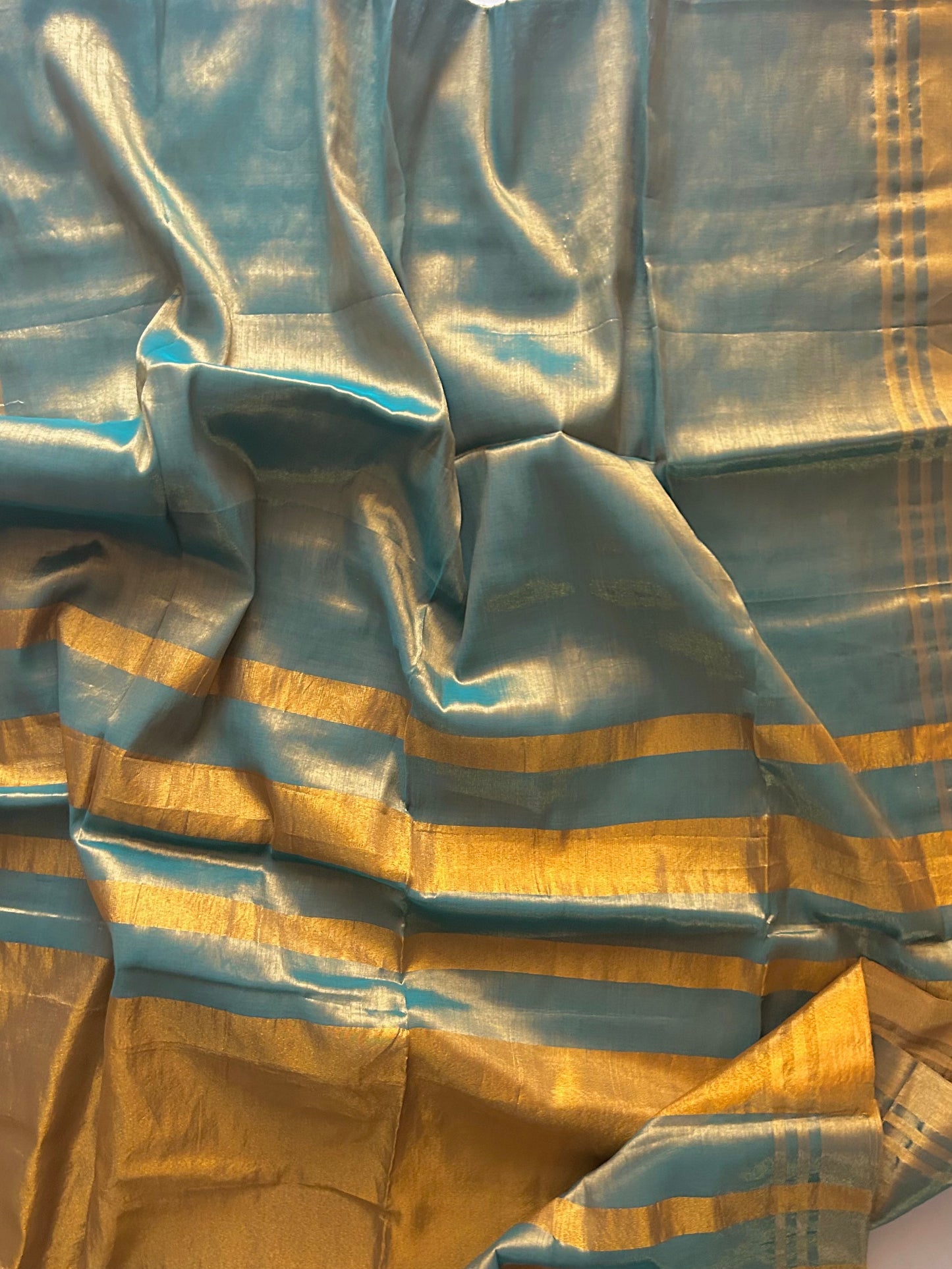 Teal blue mul mul tissue saree