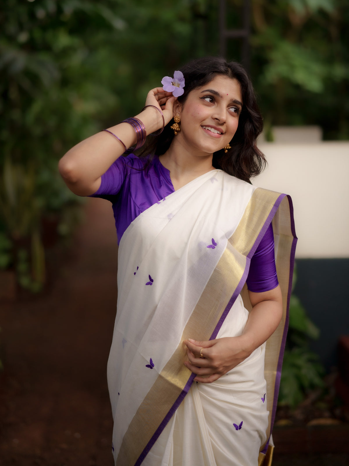 Kasavu saree in embroidery - Russian violet