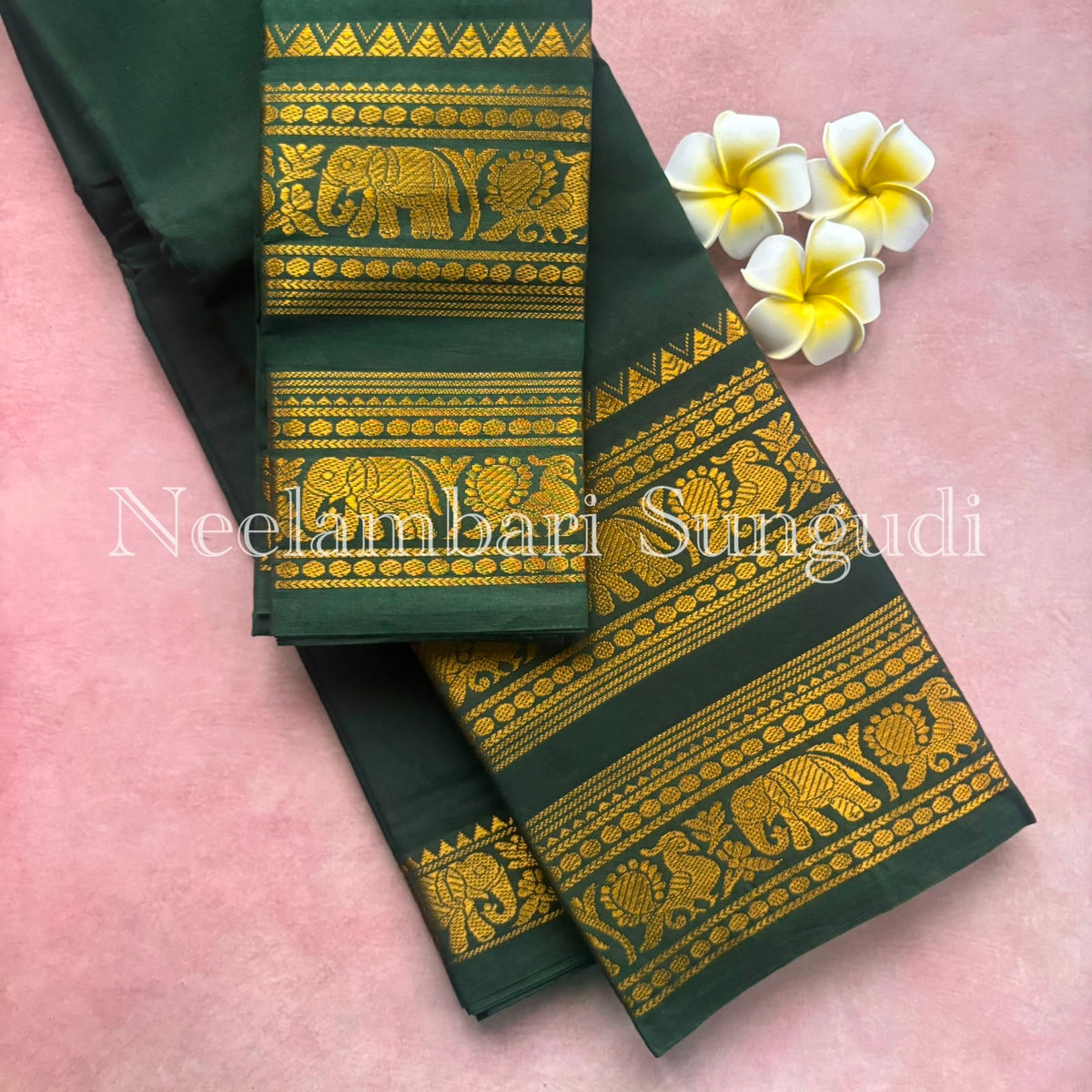Sungudi saree with rettapett border - green