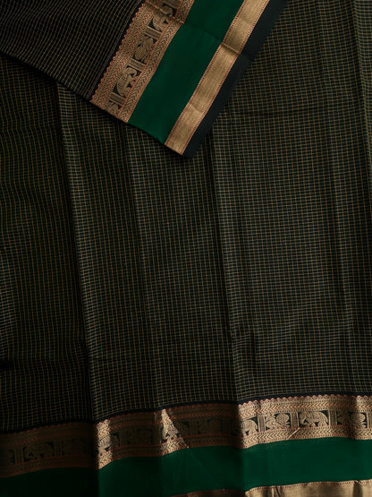 120 mercerised Kanchi cotton with checks on green base with grand pallu