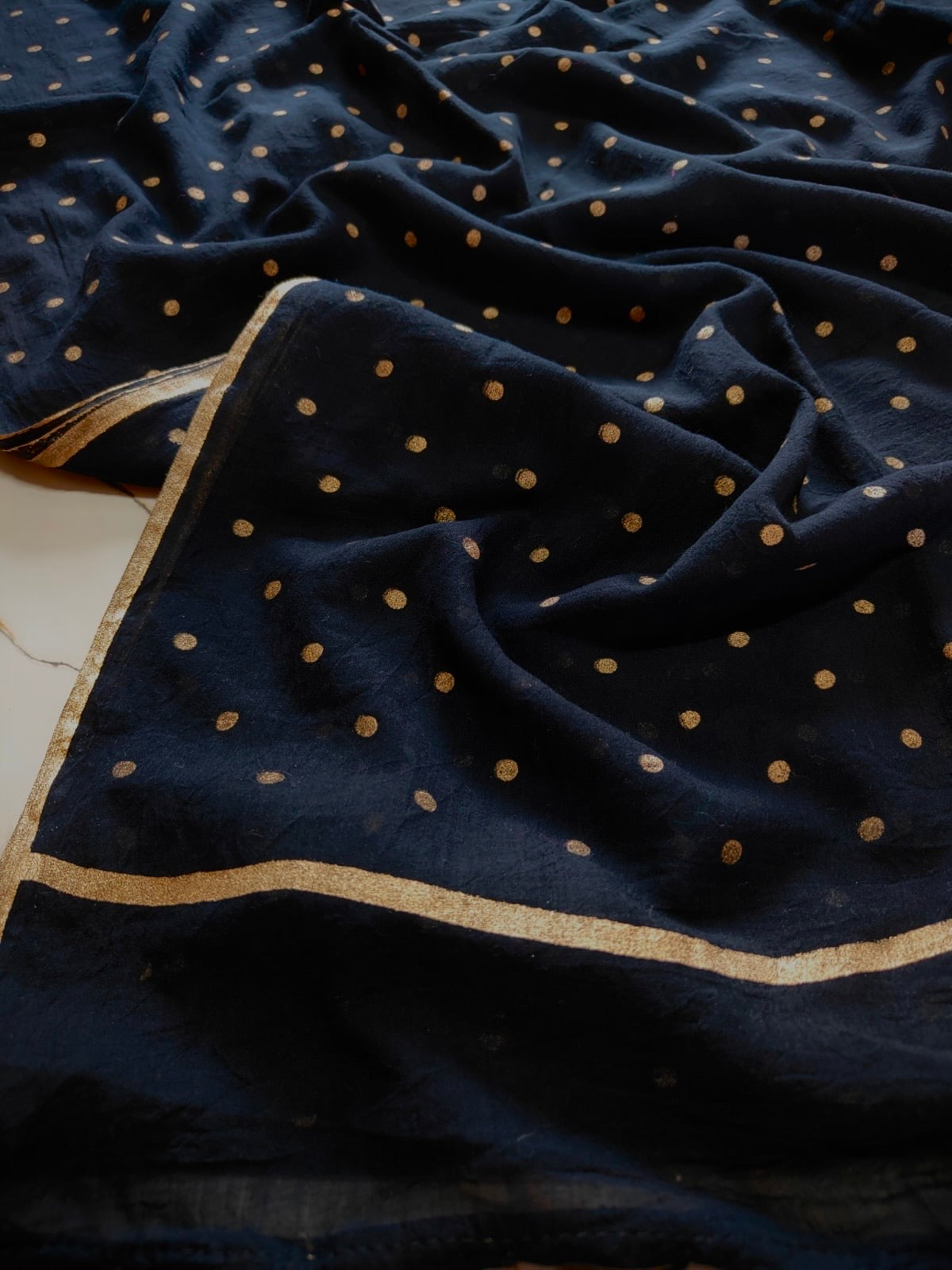 Black Mul mul saree in golden polka dots