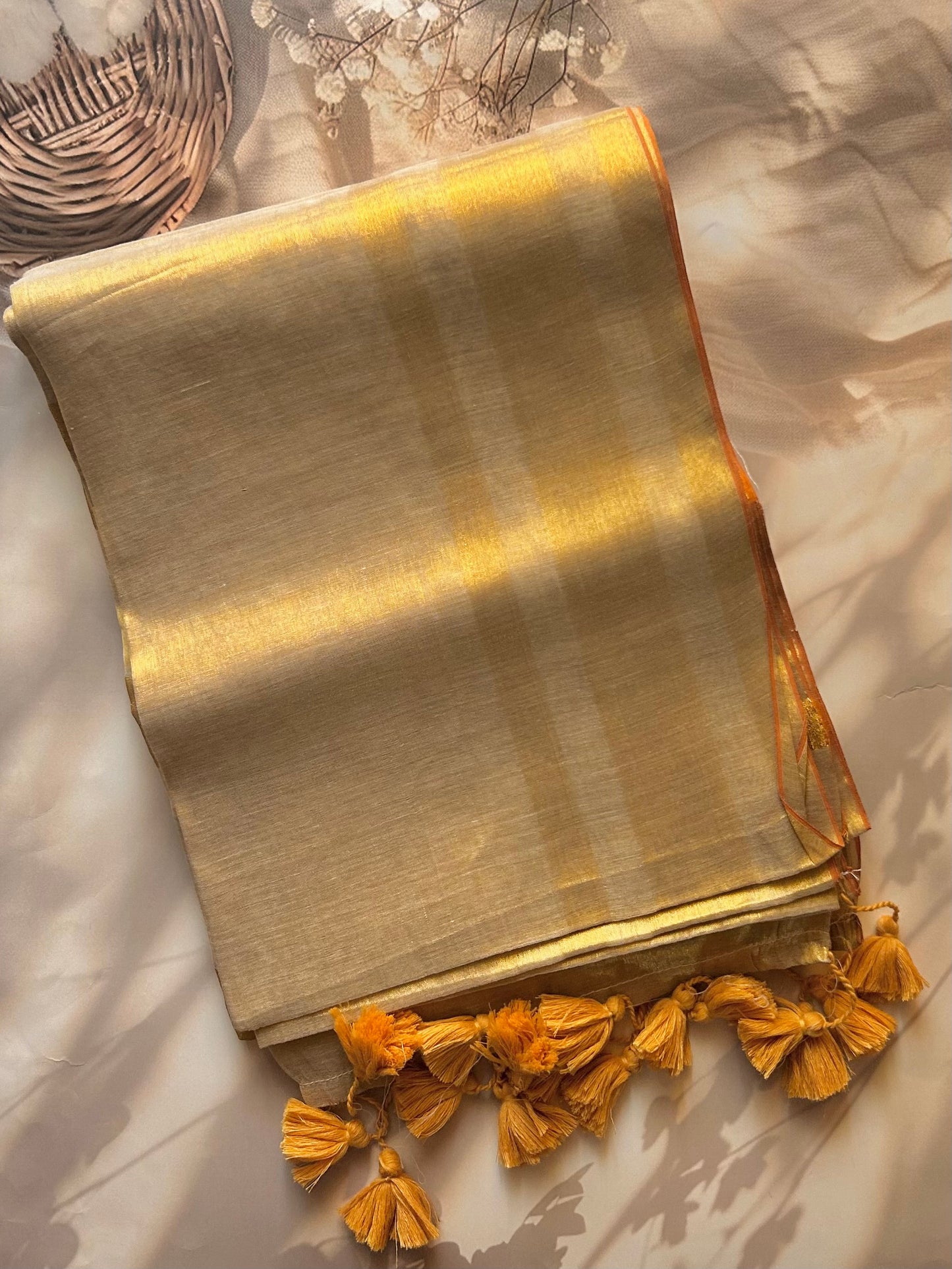 Gold mul tissue saree