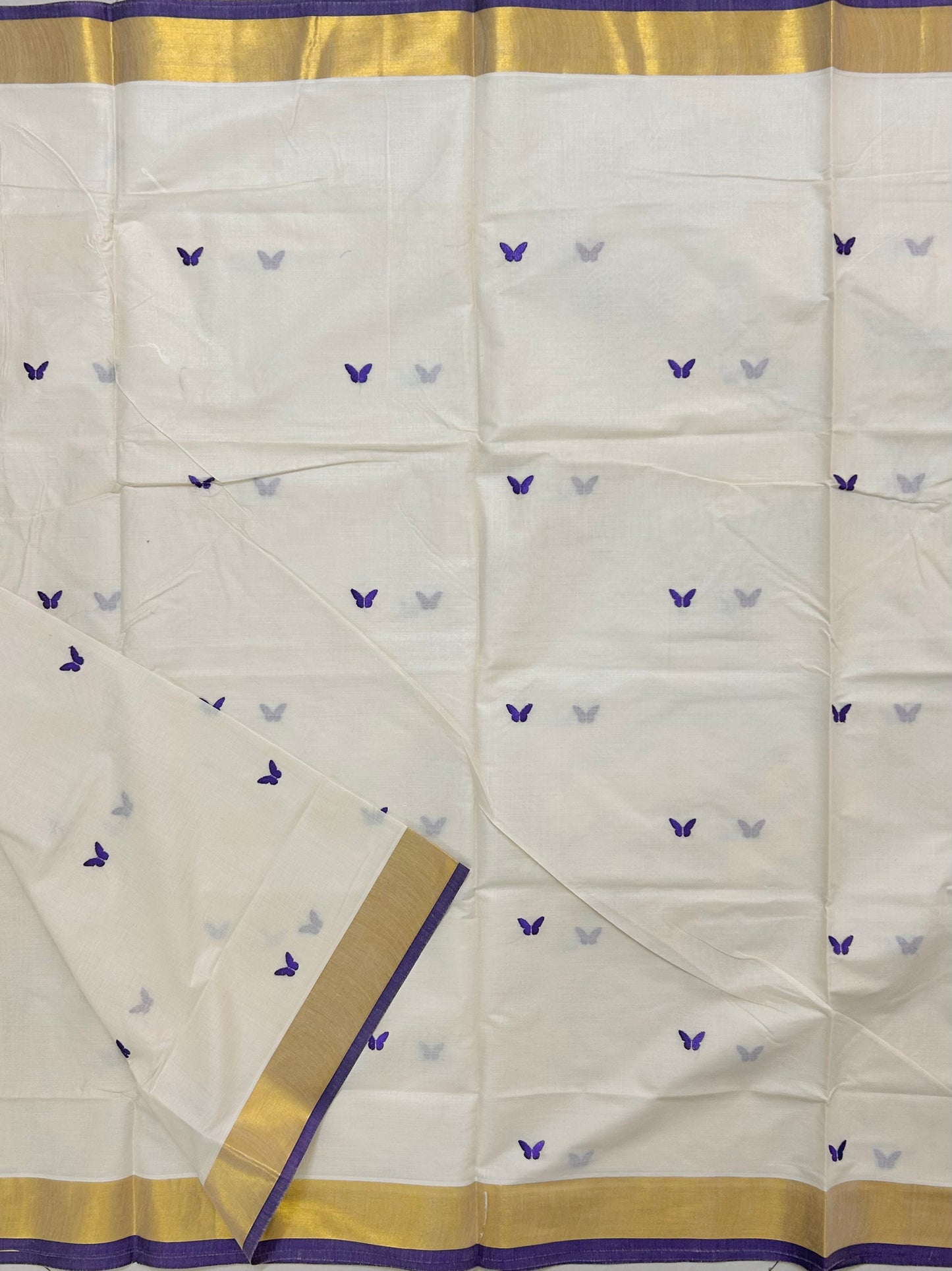 Kasavu saree in embroidery - Russian violet