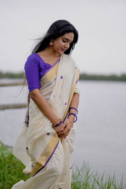 Kasavu saree in lotus embroidery - Russian violet