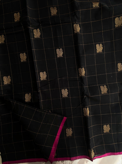 Kanchi cotton with premium zari weaves black with pink border