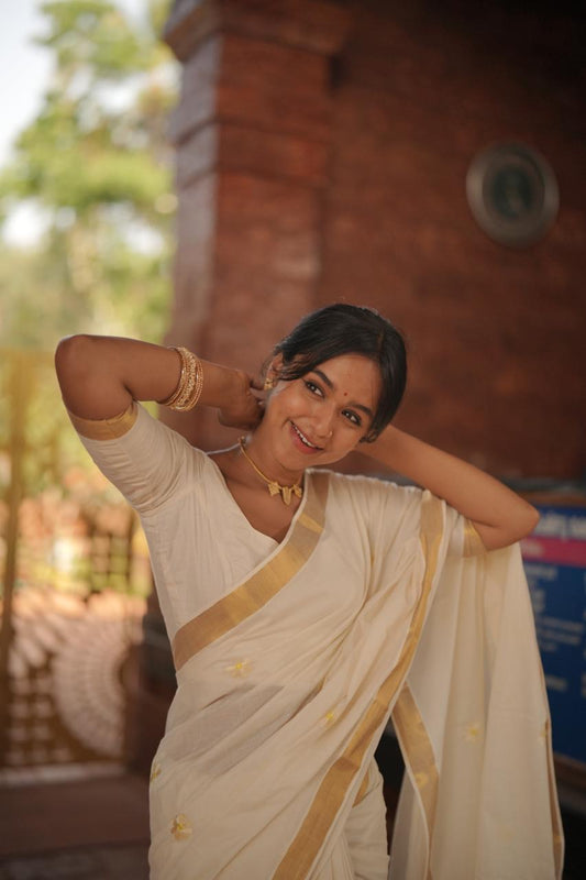 Kasavu saree in daisy embroidery