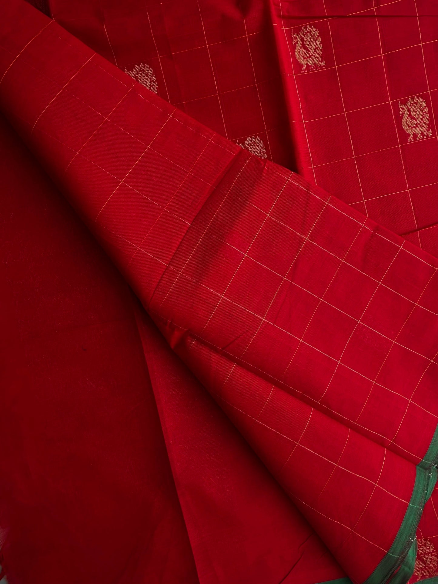 Kanchi cotton with premium zari weaves red with green border
