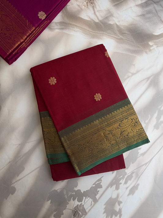 Kanchi cotton saree in butta weaves with grand pallu dark red