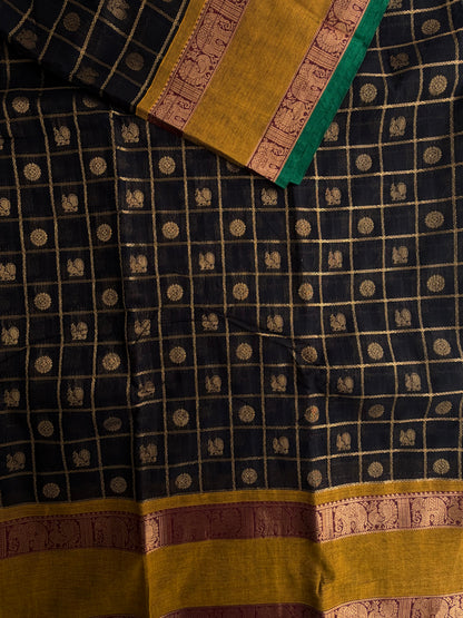 Kanchi cotton saree in zari check & butta weaves in black with a grand pallu