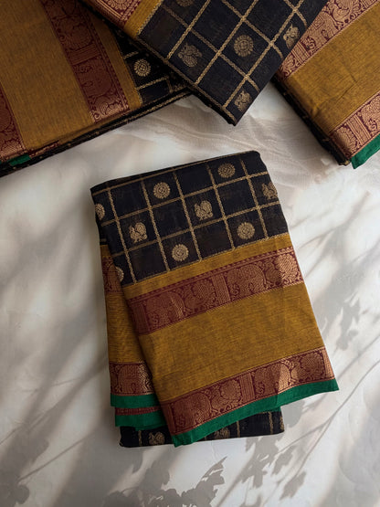 Kanchi cotton saree in zari check & butta weaves in black with a grand pallu