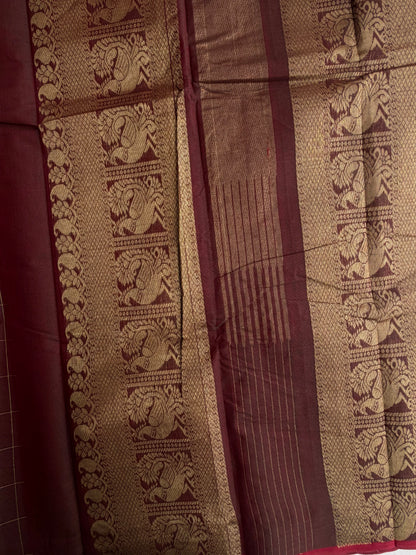 Kanchi cotton saree with checks & peacock zari weaves with a grand pallu