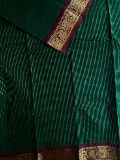 Kanchi cotton saree with zari stripes green