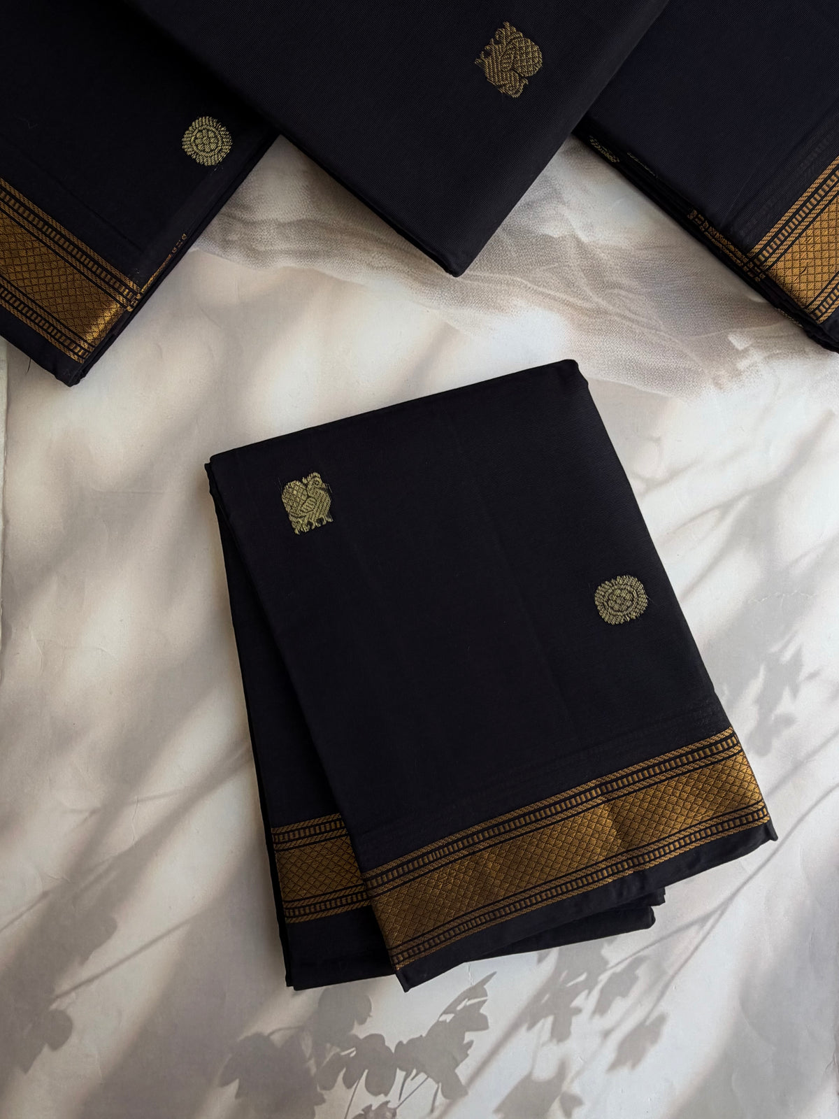 Kanchi cotton with zari weaves on body and pallu black