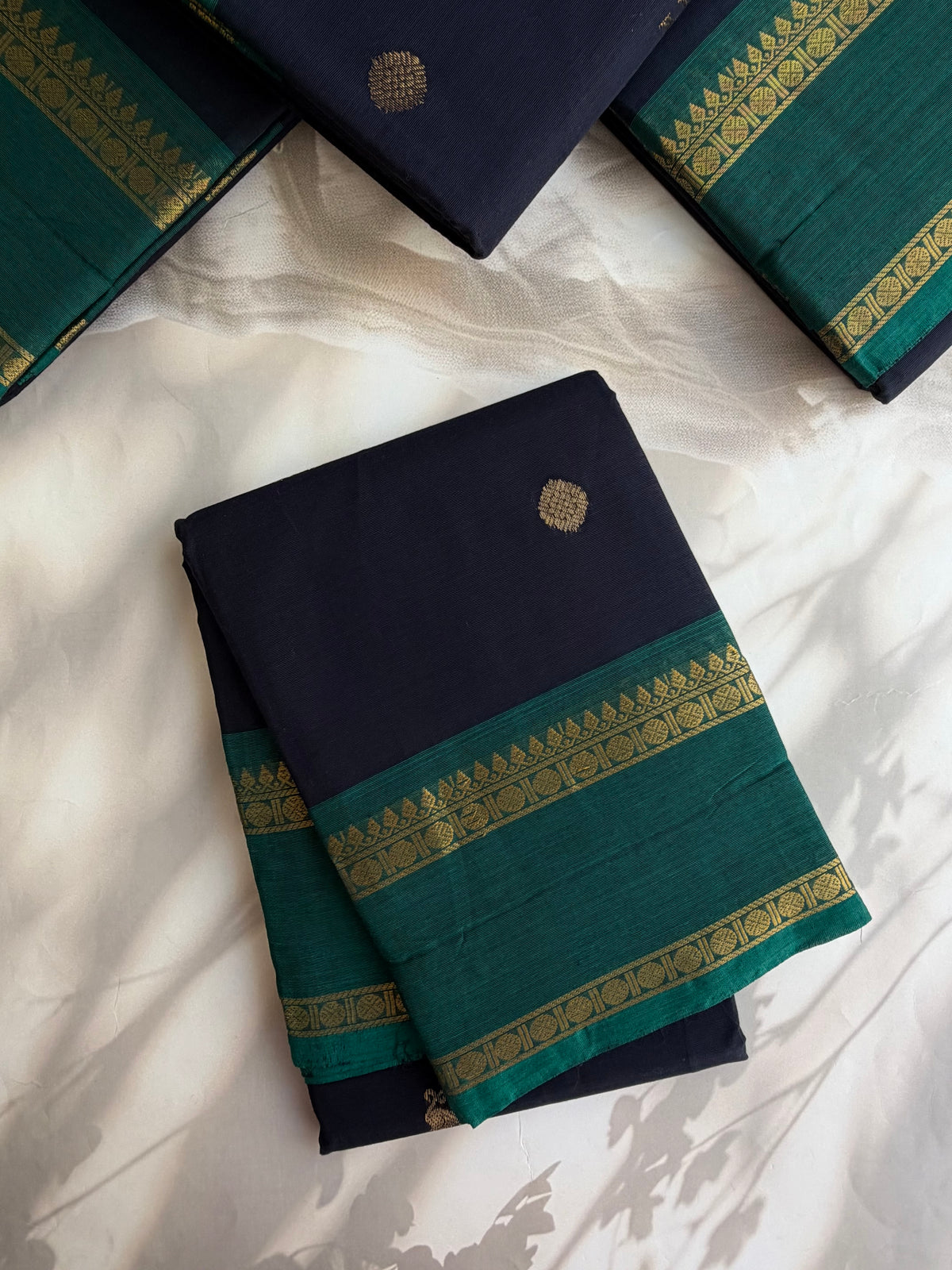 Kanchi cotton saree with butta weaves & zari pallu navy blue