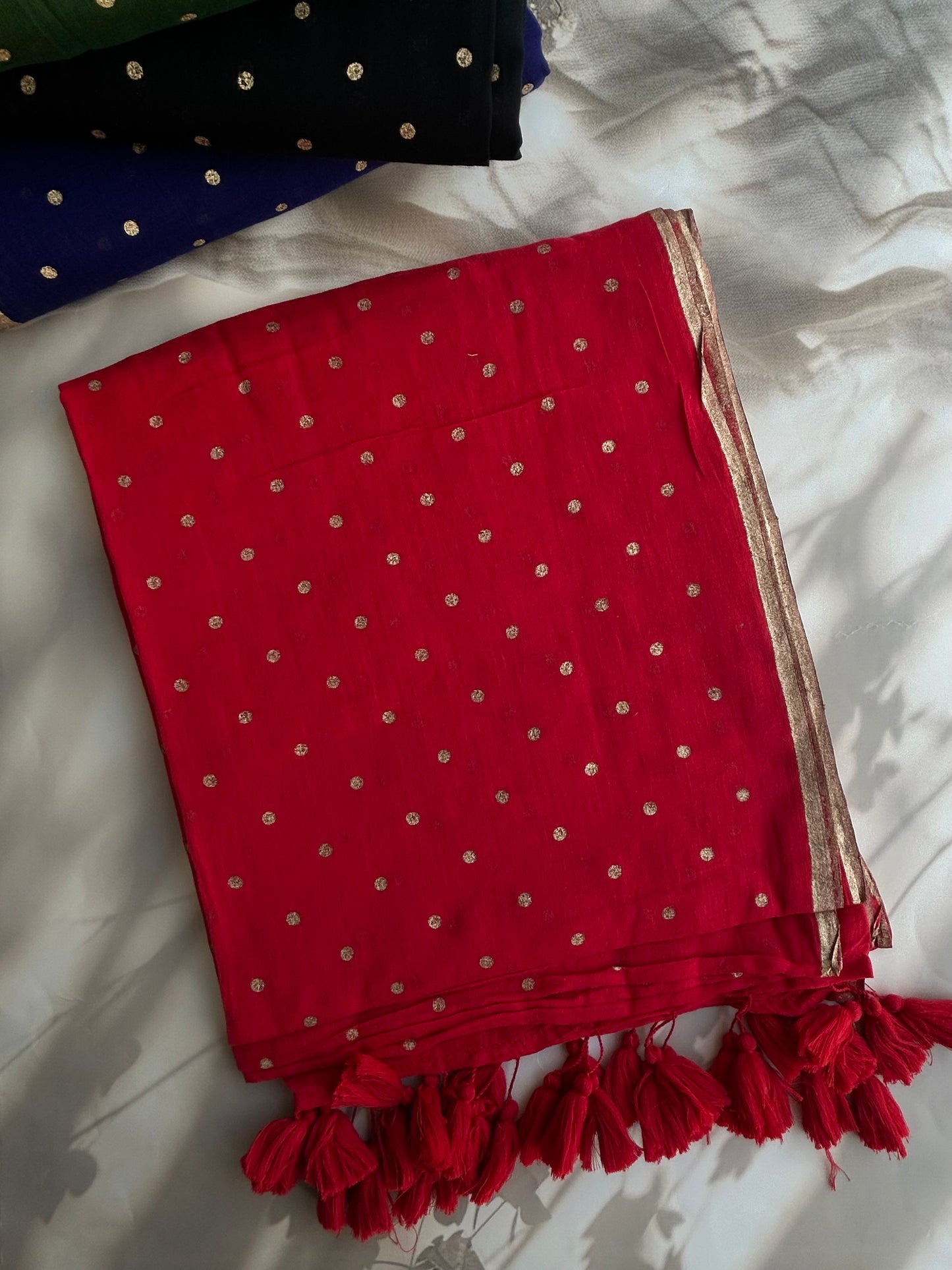 Red Mul mul saree in golden polka dots