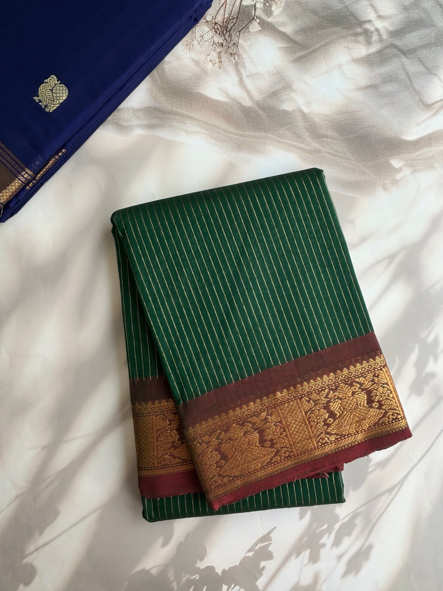 Kanchi cotton saree with zari stripes green
