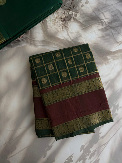 Kanchi cotton saree with checks & butta weaves with a grand pallu - green